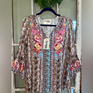 Savannah Jane blouse with intricate embroidery.